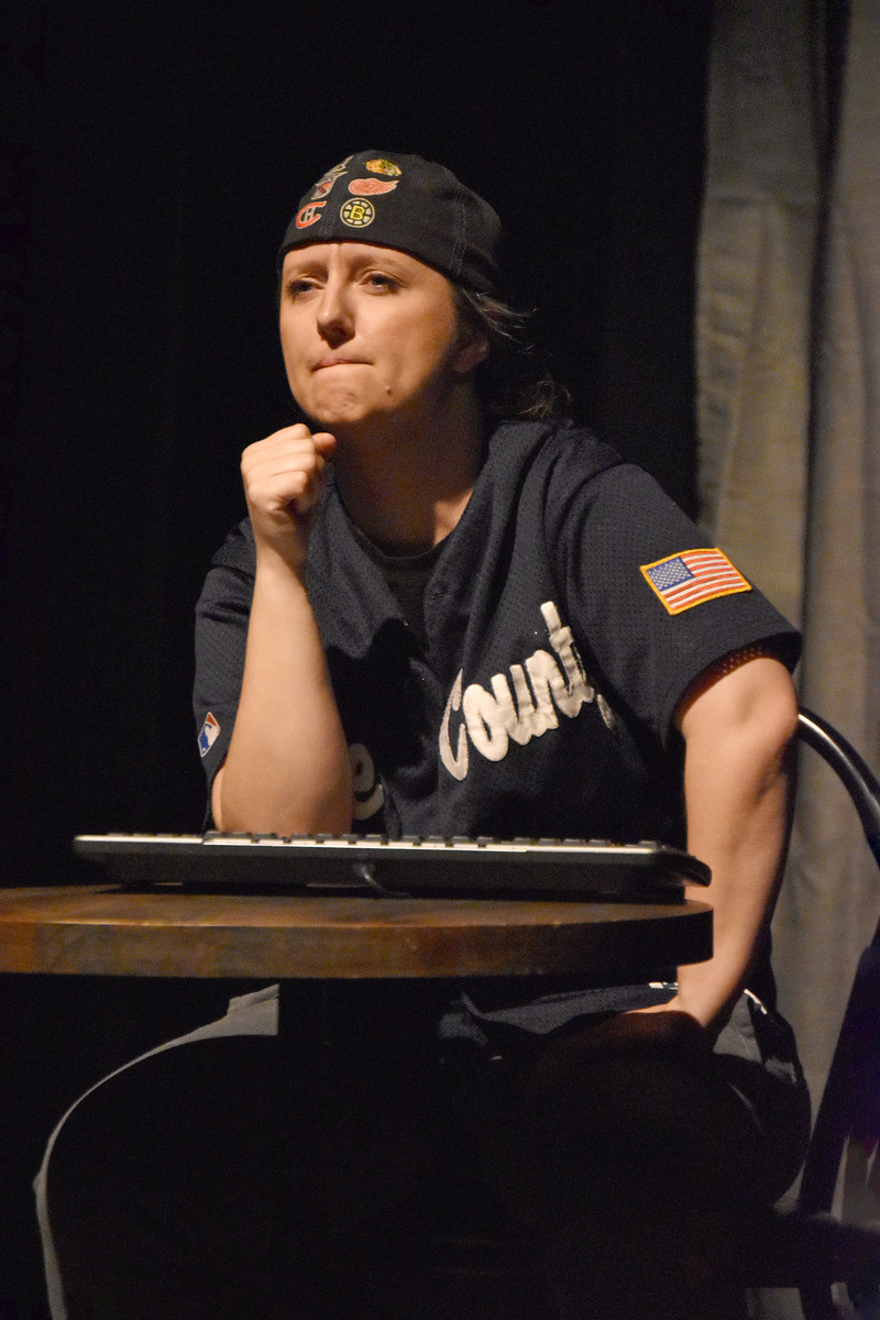 At her keyboard, chin on her fist, she looks unconvinced.